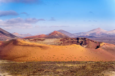 Scenic view of crater against sky