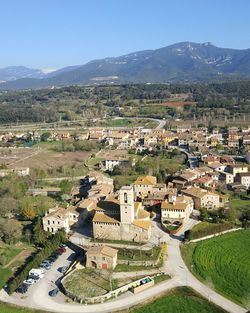High angle view of river and mountains against clear sky