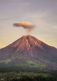 Scenic view of mountains against sky during sunset