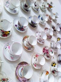 Full frame shot of empty tea cups arranged on table