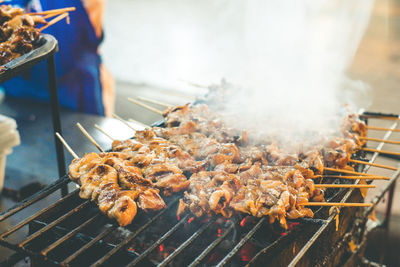 Close-up of meat on barbecue grill