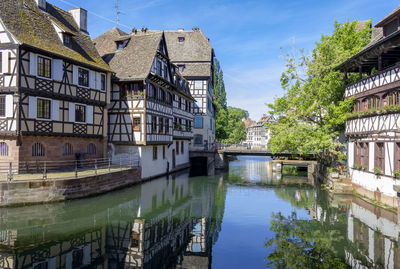 Sunny waterside impression of strasbourg, a city at the alsace region in france