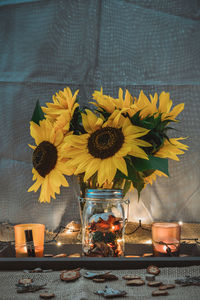 Close-up of sunflowers in vase on table