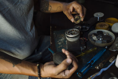 High angle view of man working on table