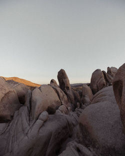 Rock formations against clear sky