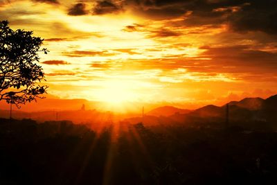 Scenic view of landscape against sky during sunset