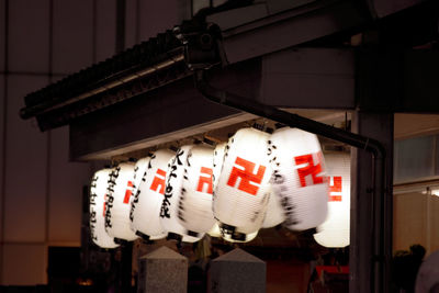 Low angle view of lantern hanging on ceiling in building