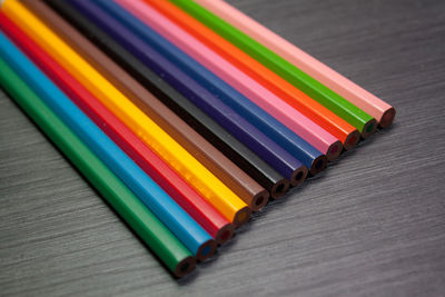 Close-up of colorful pencils on table