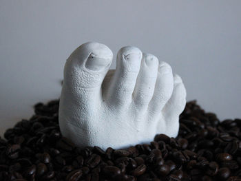 Close-up of coffee beans on table