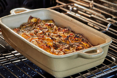 Potato and sweet potato gratin with provence herbs is baked in the oven. french gourmet cuisine