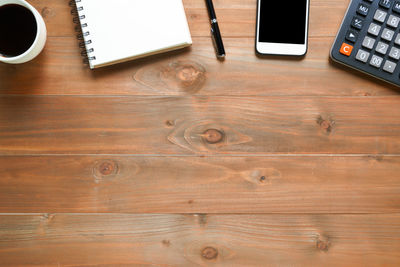 High angle view of mobile phone on table