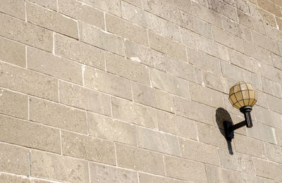 Low angle view of brick wall