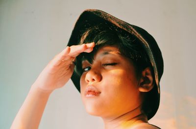 Close-up portrait of boy looking away