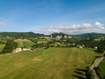 Scenic view of agricultural field against sky