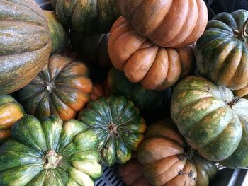 High angle view of pumpkins in crate at market