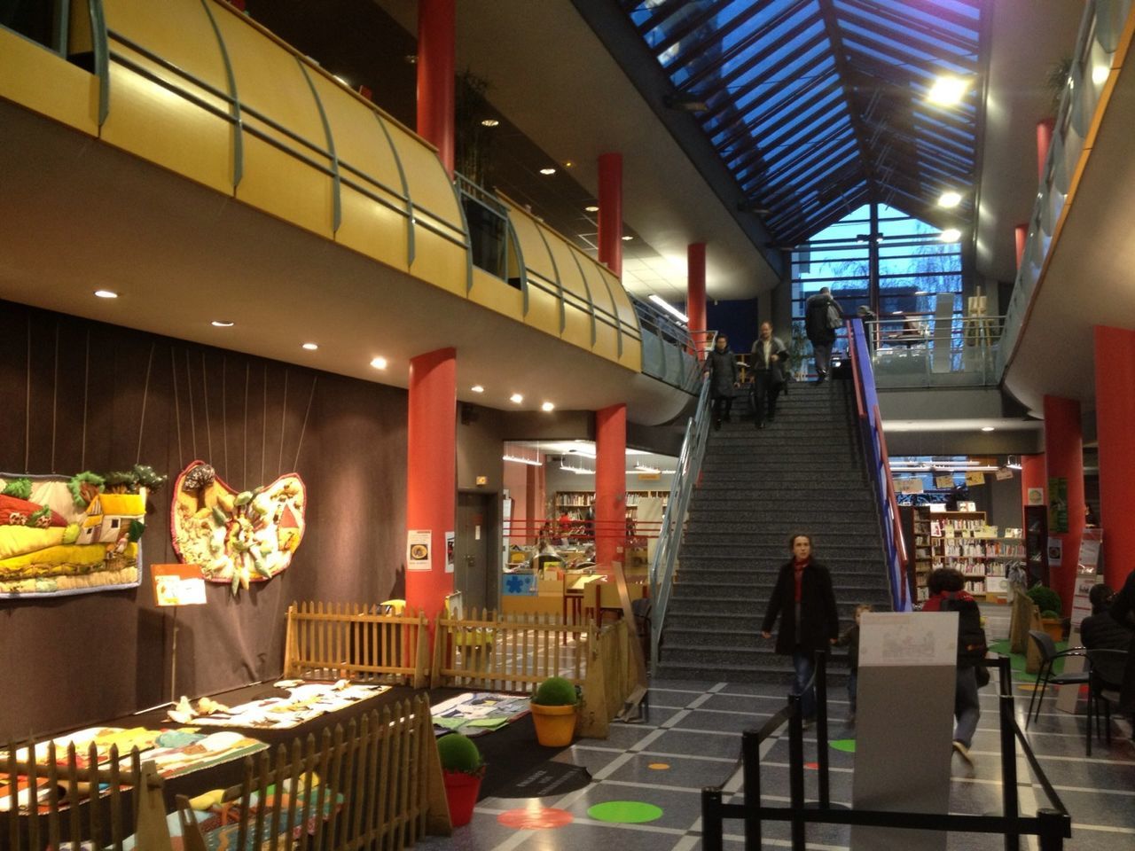 illuminated, night, indoors, architecture, built structure, restaurant, retail, lighting equipment, store, incidental people, building exterior, chair, men, table, in a row, city, shopping, arrangement, large group of objects