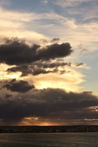 Scenic view of dramatic sky during sunset