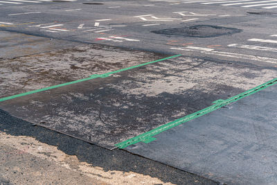 High angle view of road marking on street