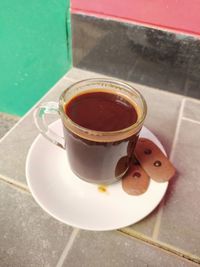 High angle view of coffee cup on table