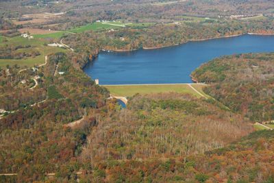 High angle view of countryside lake along landscape