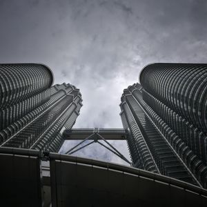 Low angle view of modern buildings against sky