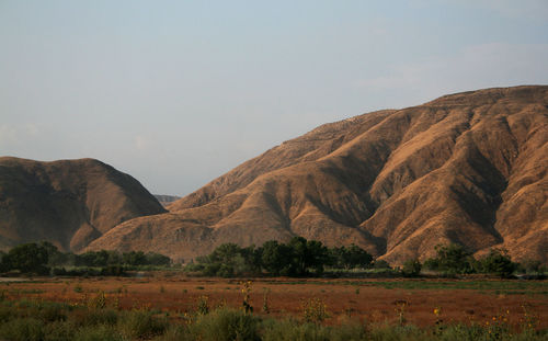 Scenic view of mountains against clear sky