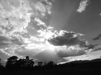 Scenic view of landscape against cloudy sky