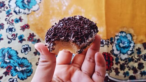 Midsection of person holding ice cream