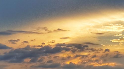 Low angle view of clouds in sky during sunset