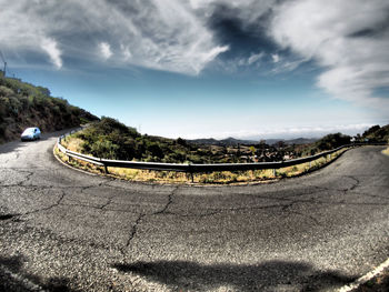 Panoramic view of road on mountain against sky