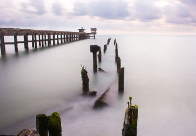 Pier on sea against sky