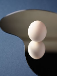 Close-up of eggs in container on table