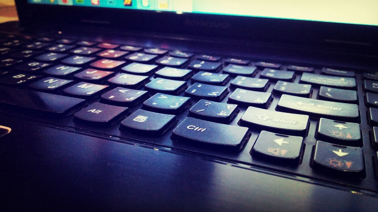 indoors, close-up, still life, communication, table, technology, high angle view, number, in a row, no people, computer keyboard, connection, metal, order, large group of objects, text, arrangement, western script, repetition, black color