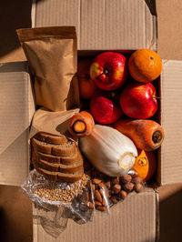 Healthy food delivery harsh shadow. take away products package donation box online shopping delivery