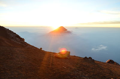 Scenic view of landscape against sky during sunset