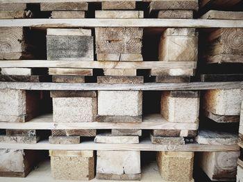 Full frame shot of logs in forest