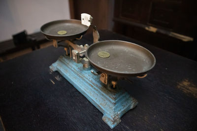 High angle view of old machine part on table