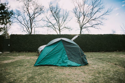 Tent on field against sky