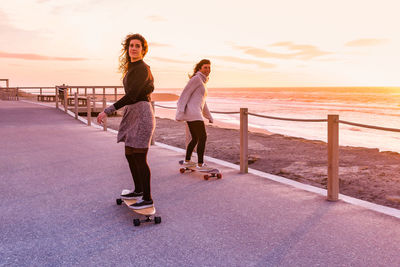 Full length of woman walking on road