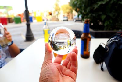 Close-up of a man drinking glass