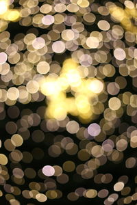 Defocused image of illuminated christmas lights