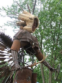 Low angle view of statue against trees