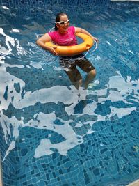 High angle view of man swimming in pool