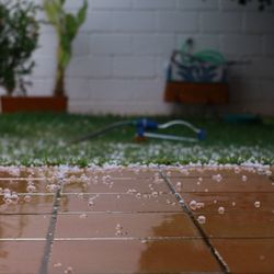 Surface level of wet floor against wall