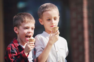 Portrait of boy eating ice cream