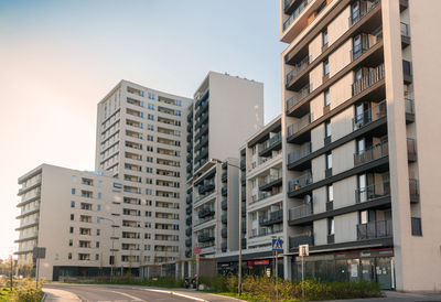 Low angle view of buildings against sky in city