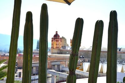 Panoramic view of buildings in city against sky