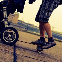 Low section of woman standing on tiled floor