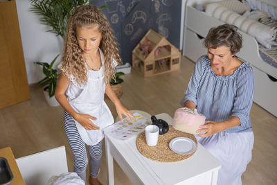 Female friends working at home