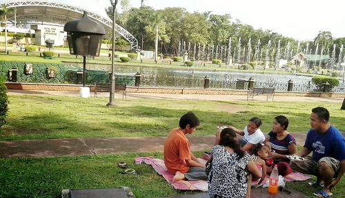 People relaxing in park